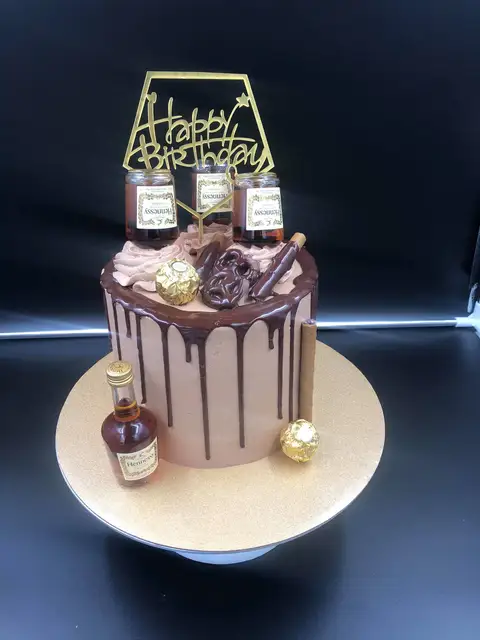 Birthday drip cake with bottles