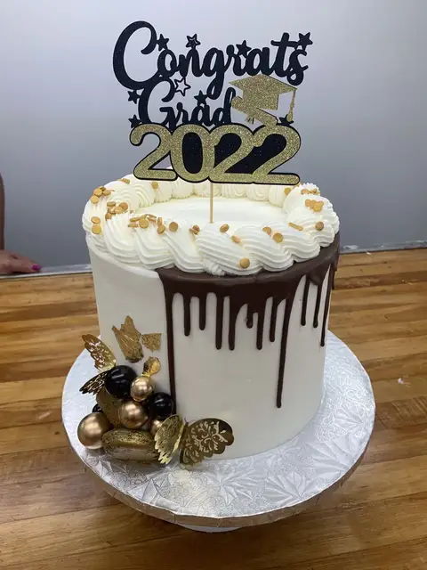 Graduation cake with chocolate drip