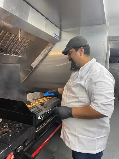 Chef cooking at the grill